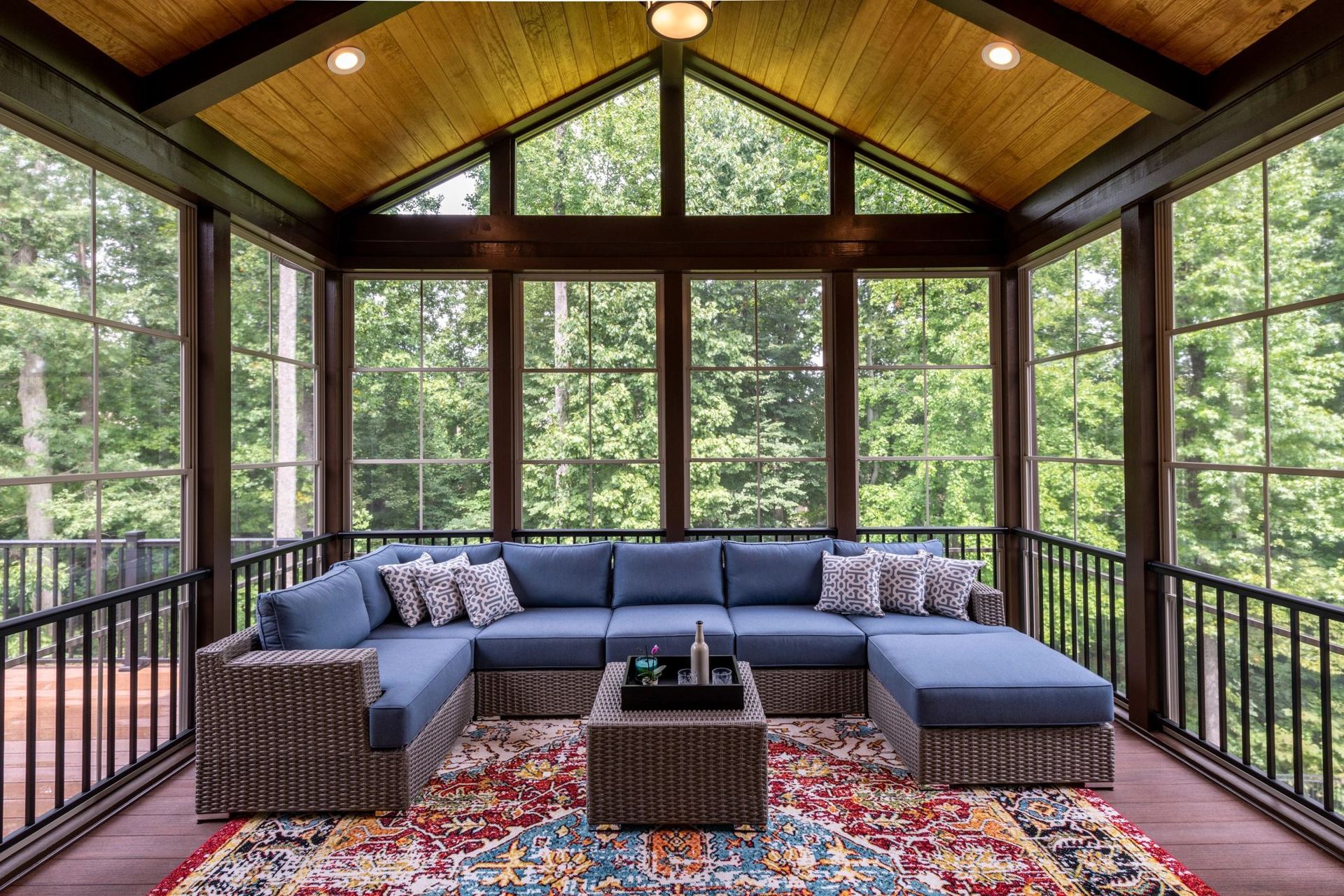 Screened sunroom porch with vaulted wood ceiling in Connecticut